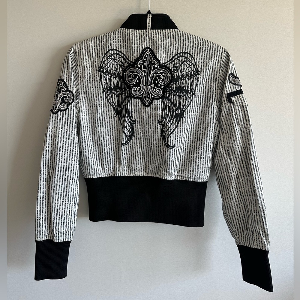 Black & white striped bomber jacket with embroidered Fleur de Lis details